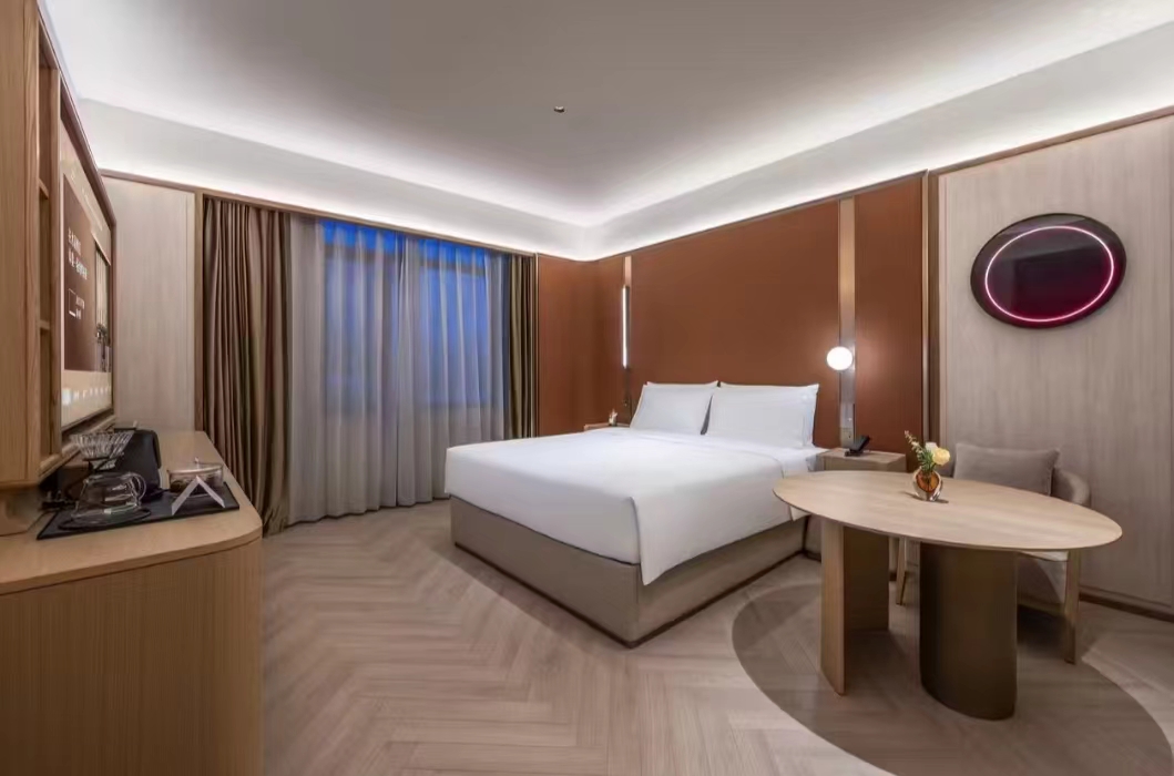 桔子水晶哈尔滨群力机场路店豪华大床房客房图